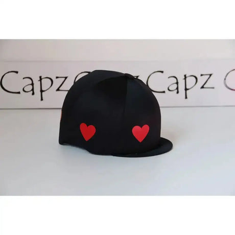 Black capz motif cap with two red heart patches front made from cover lycra heartz for equestrian use