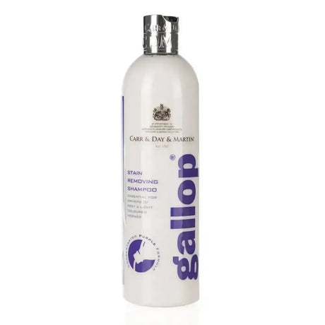 A sleek white bottle of carr & day martin gallop stain removing shampoo with a silver cap and purple branding