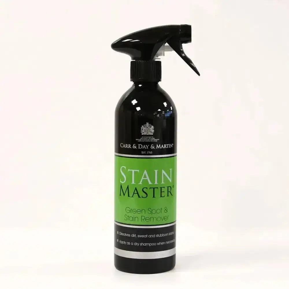 Black spray bottle with green spot label reading stain master by carr & day martin stainmaster for stain removal