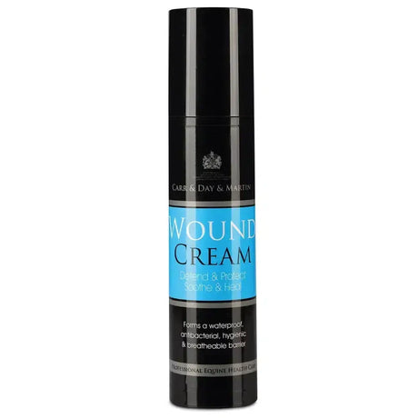 Black cylindrical bottle of carr & day martin wound cream with bright blue label and silver text for skin care