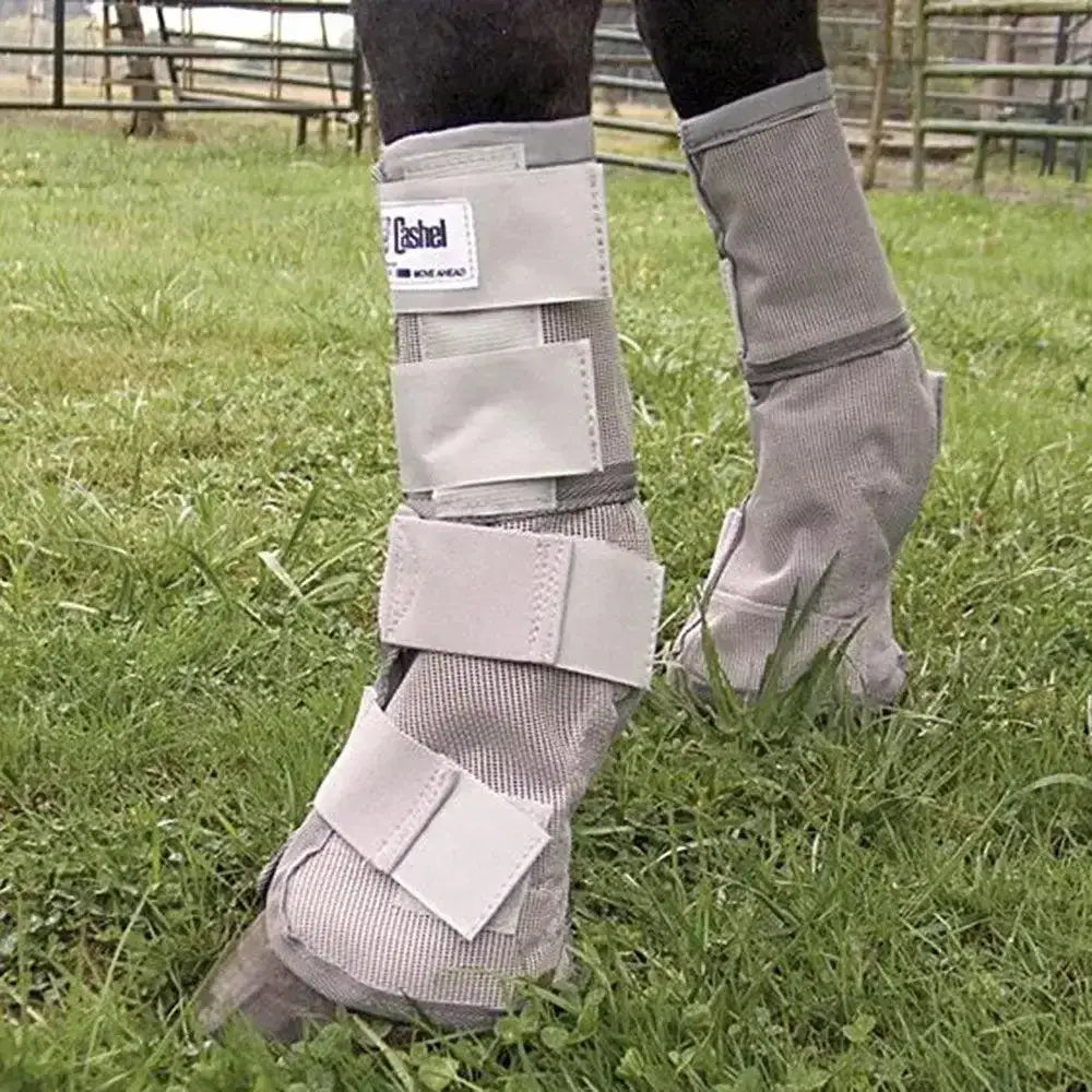 Gray mesh cashel crusader leg guards with adjustable velcro straps and white label for summer use