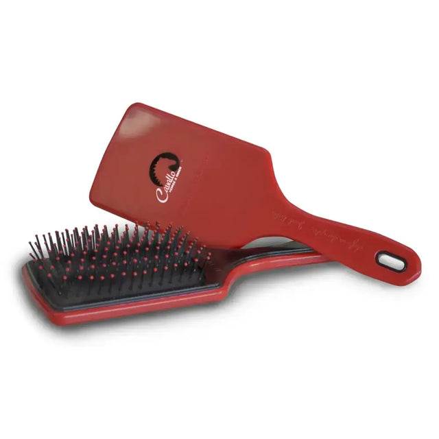 Red plastic cavallo tail brush with black bristles pink-tipped ends and cavallino logo on handle perfect for grooming