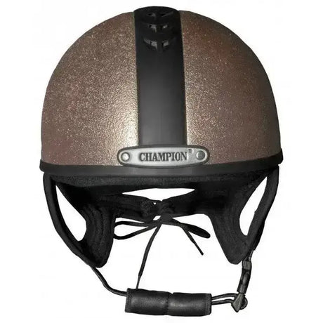 A shimmering bronze rose gold riding helmet with black stripe and champion ventair sport emblem for ventair sport riding