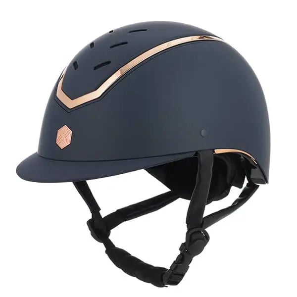 Navy blue charles owen eqx kylo riding helmet with rose gold accents and matching logo emblem for equestrian use