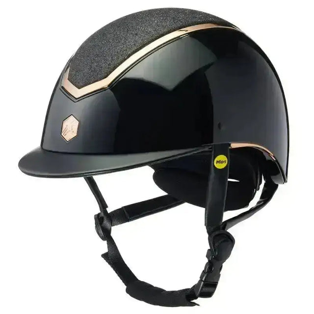 Black charles owen eqx kylo sparkly riding helmet with glossy finish gold accents and hexagonal logo on front