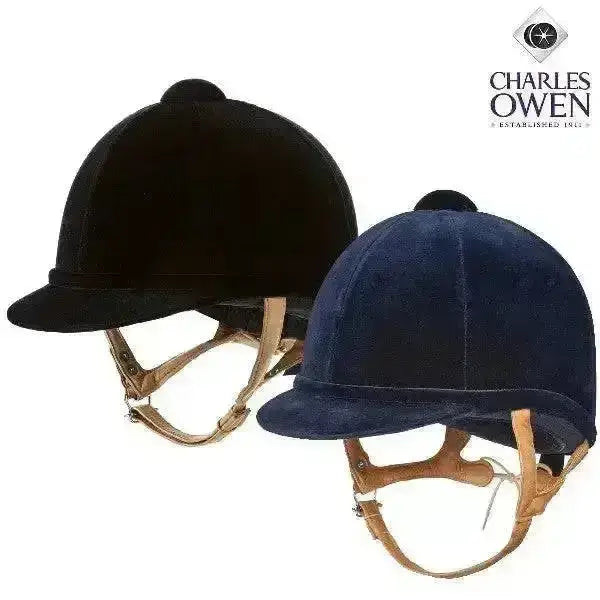 Black and navy blue velvet charles owen fian riding hats with tan leather straps in the owen fian velvet style