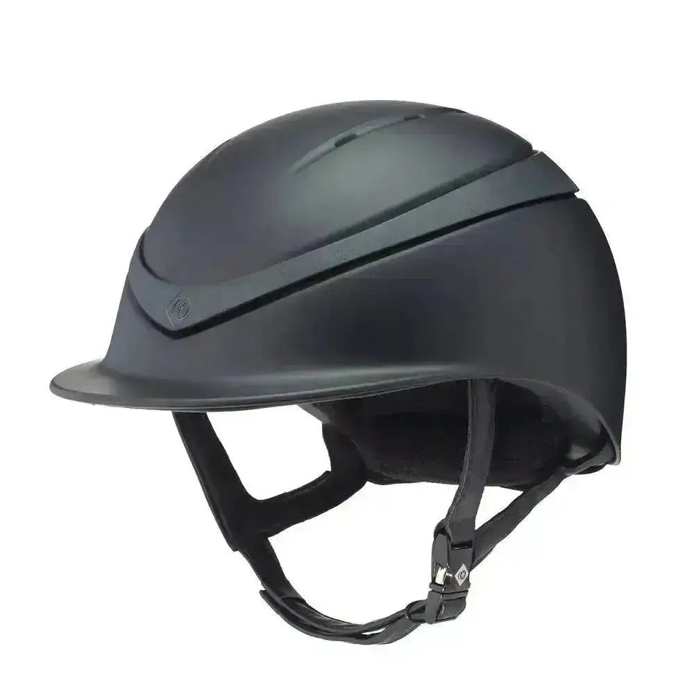 Matte black charles owen halo riding helmet with sleek design and adjustable straps for equestrian use
