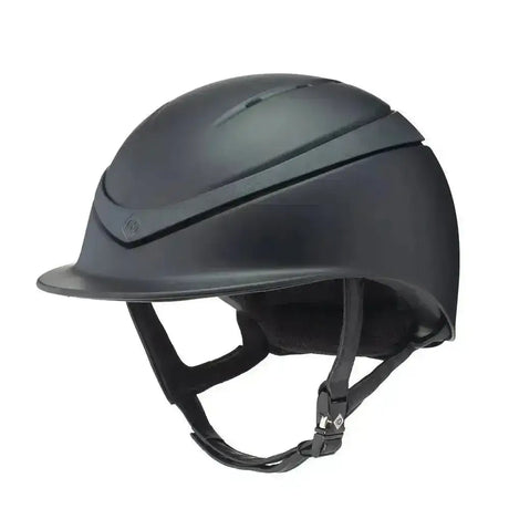 Matte black charles owen halo riding helmet with sleek design and adjustable straps for equestrian use