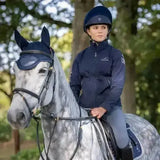 A navy blue charles owen pro 11 plus riding hat with a subtle diamond logo designed for precision-fitting cross-country skulls