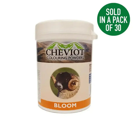Cheviot sheep colouring powder in a white plastic container with an orange label and mountain logo for professional use