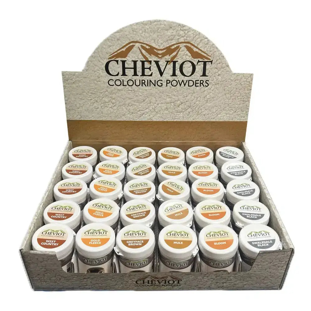 Cheviot sheep colouring powder in colorful small white containers neatly arranged in a cardboard display box