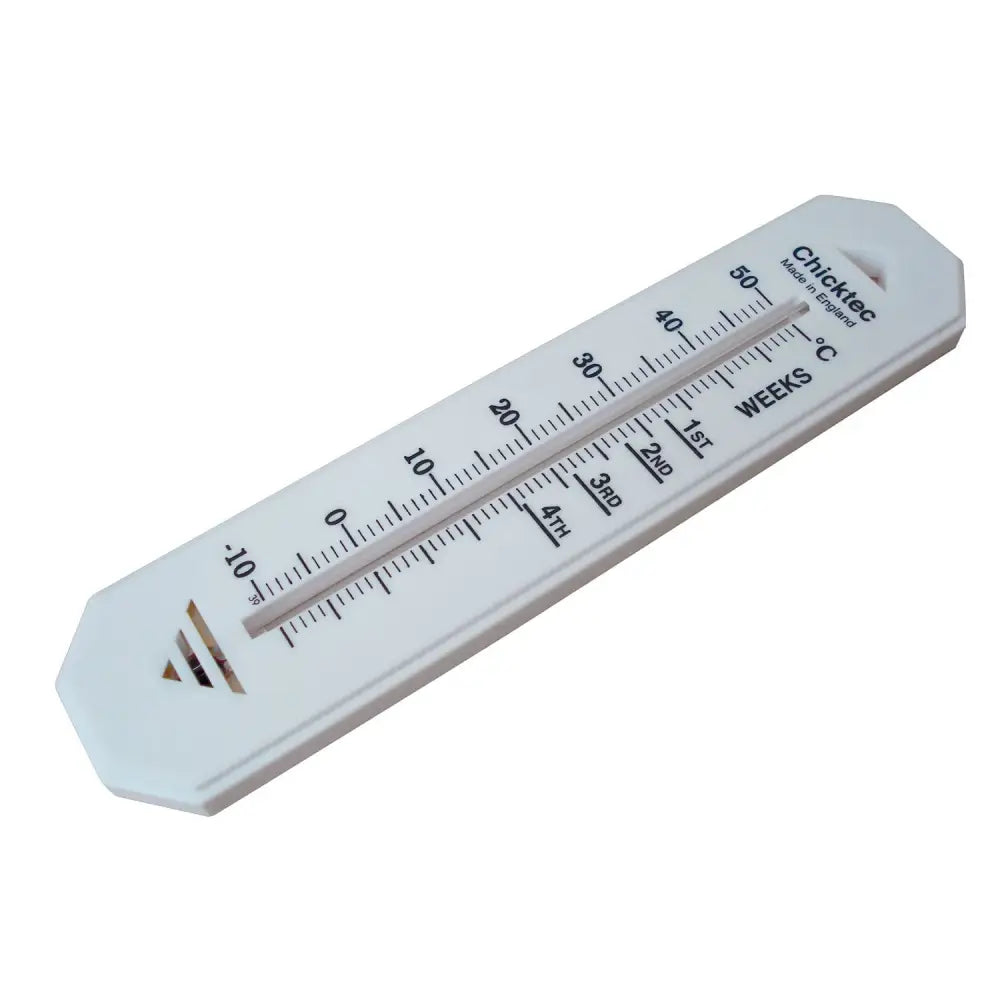 White plastic chicktec comfort thermometer with dual temperature and weeks scales marked by black numerals