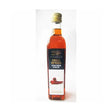 A clear glass bottle of merchant gourmet chilli infused extra virgin olive oil with gold cap and red pepper label