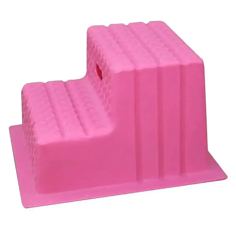 Pink plastic two-step mounting blocks with ribbed texture and hole on upper step from classic showjumps