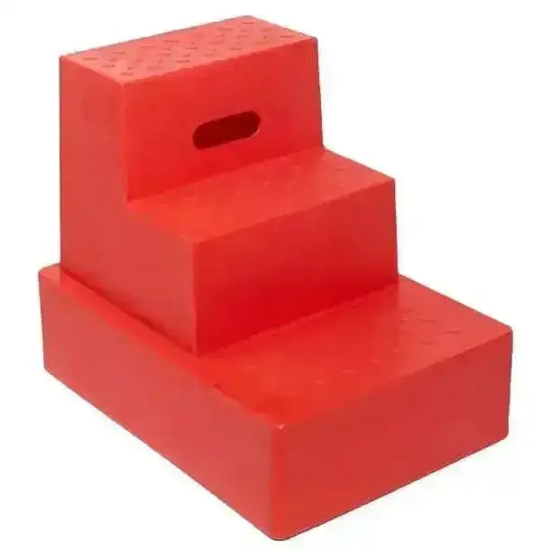 Red plastic classic showjumps three tread mounting block with textured surfaces and handle cutout step mounting blocks