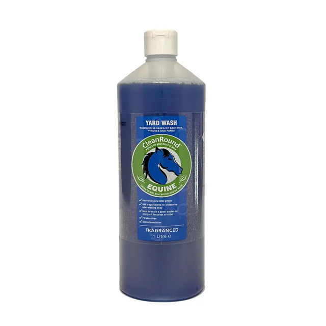 Cleanround fragranced yard wash in a clear plastic bottle with blue liquid and green label for fresh horse yards