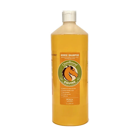 A translucent amber bottle of cleanround medicated shampoo peach with white flip top cap and orange label with horse logo