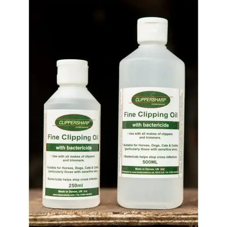 Two transparent plastic bottles of clipper sharp fine clipping oil with bactericide prevent cross infection with essential oils