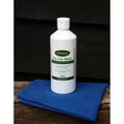 White plastic bottle of clippersharp pre clip wash with green label and white cap for effective grease removal 500ml