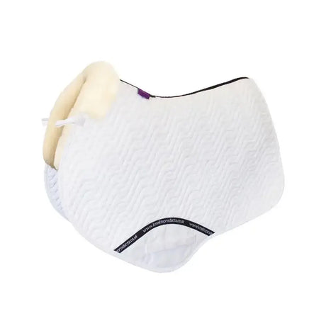 White quilted close contact pad with cream lambswool rolled edge and black trim from distinction range close