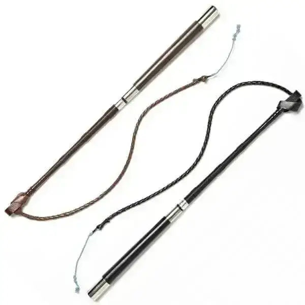 Two black leather long cob showing riding crops with silver ferrules and braided and solid handles by county whips
