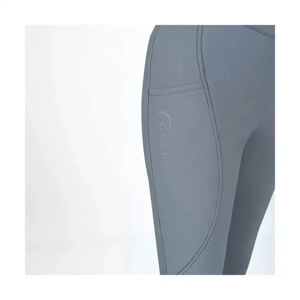 Gray coldstream balmore thermal riding tights with subtle stitched pocket and embossed logo made from brushed fleece riding material