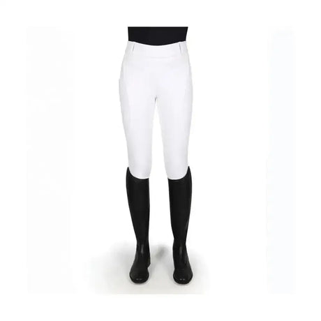 White coldstream balmore thermal riding tights with brushed fleece, smooth fit, paired with black knee-high boots