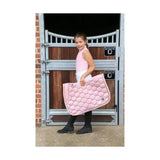 Pink quilted horse saddle pad with hexagonal pattern shown with coldstream cranshaws sleeveless base layer