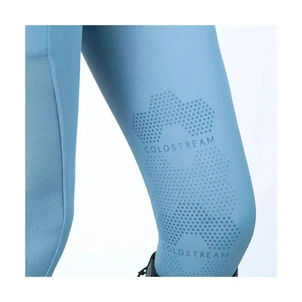 Light blue coldstream ednam riding tights with subtle dotted cloud pattern and technical capillary action logo visible