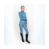 A sleek light blue coldstream ednam riding tights with high collar zipper front and technical capillary action fabric