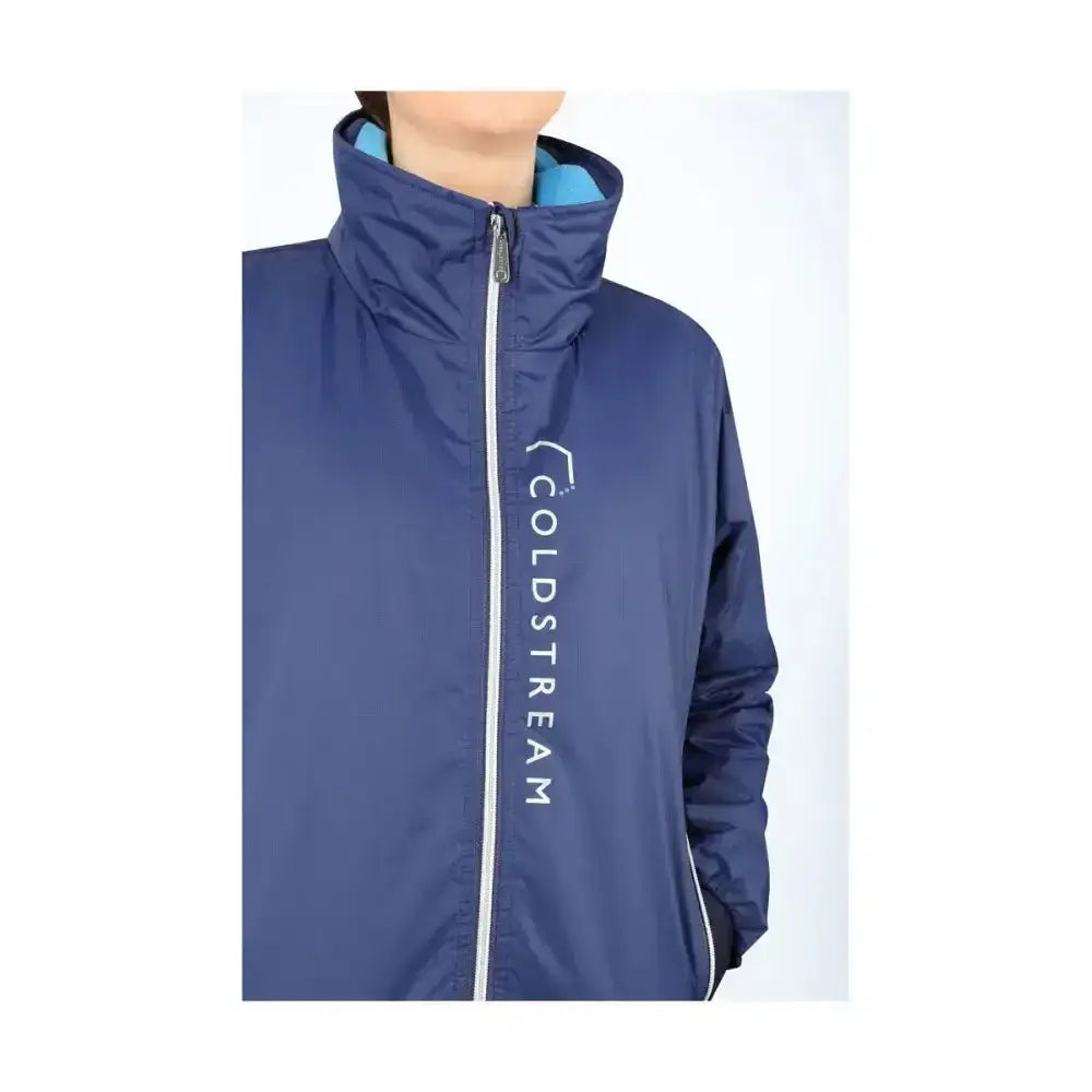 Navy blue coldstream lanton blouson jacket with white vertical branding and light blue inner lining high rise collar