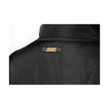 Black quilted coldstream linton lightweight puffer vest with gold metal brand tag perfect for layering