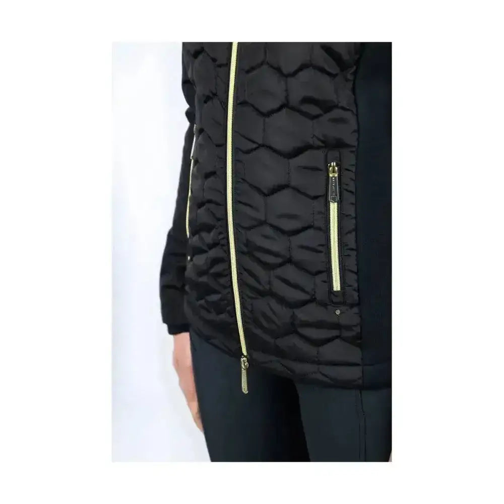 Black quilted puffer vest with honeycomb pattern and lime green zippers in coldstream linton lightweight jacket style