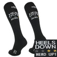 Black comodo riding socks with white and gold heels down head up text and crown emblem made from technical material