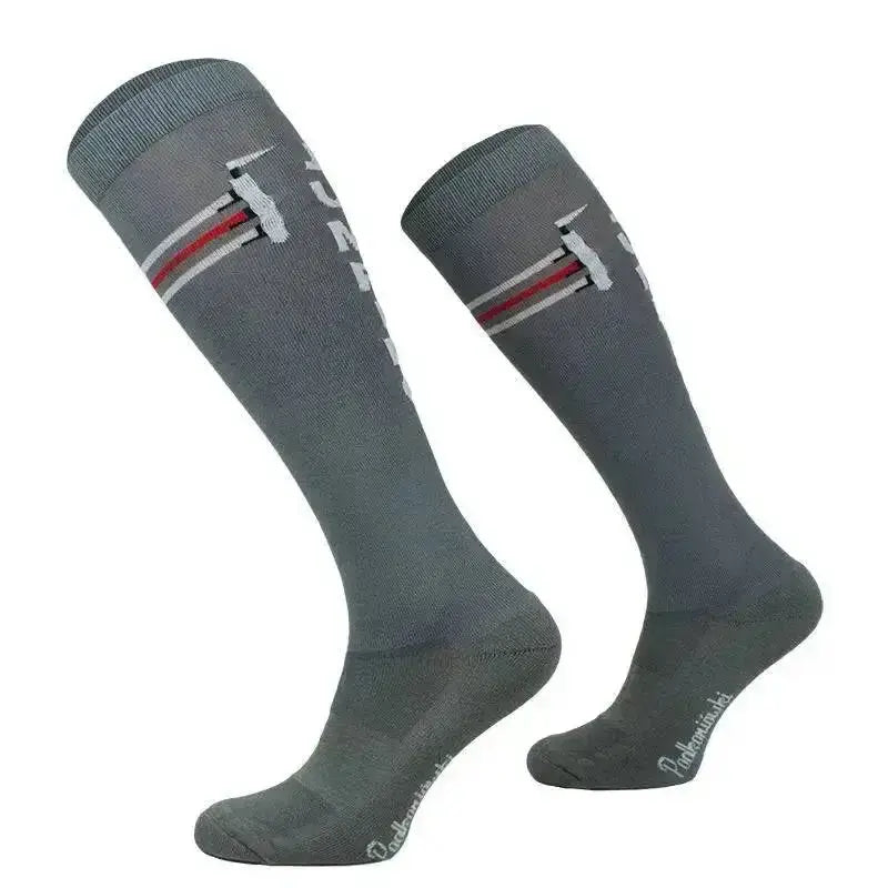 Gray comodo riding socks with white and red stripes and a subtle logo designed for jumping fence use