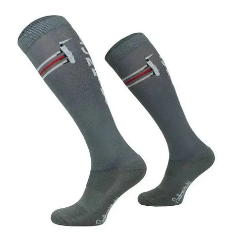 Gray comodo riding socks with white and red stripes and a subtle logo designed for jumping fence use
