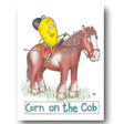 A cartoon yellow corn kernel riding a brown horse on a rectangular card from compost heap equine fun equestrian cards printed with vegetable ink green