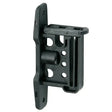 Black plastic corral clip insulator with central knob and circular cutouts ideal for fence line insulator use