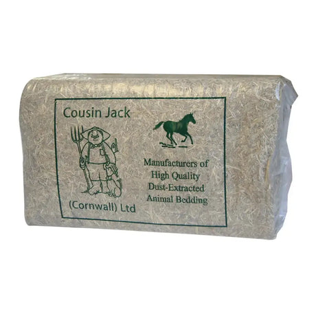 A beige package of cousin jacks chopped straw bedding with a green label showing a cartoon farmer and horse illustration