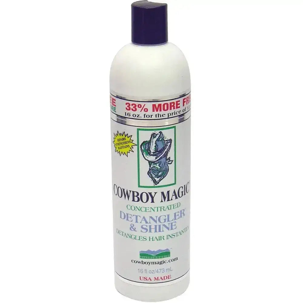 White plastic bottle of cowboy magic detangler with dark purple cap and label featuring cowboy hat for mane and tail shine