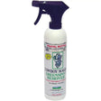 White plastic spray bottle with dark purple trigger labeled cowboy magic greenspot remover for urine spots instantly