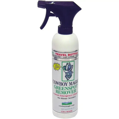 White plastic spray bottle with dark purple trigger labeled cowboy magic greenspot remover for urine spots instantly