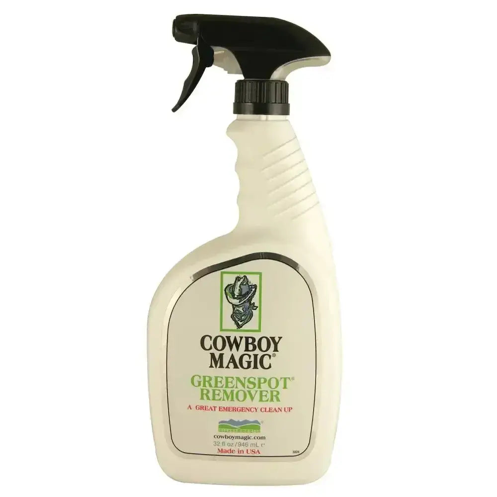 White plastic spray bottle with black trigger labeled cowboy magic greenspot remover for removing urine spots instantly