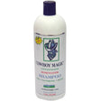 White plastic bottle of cowboy magic rosewater shampoo with dark blue cap and label featuring cowboy hat illustration