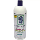 White plastic bottle with dark blue cap labeled cowboy magic yellowout stain removing shampoo for yellow stains