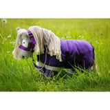 Purple plush horse toy with white mane wearing a soft velour crafty ponies fleece blanket rug set