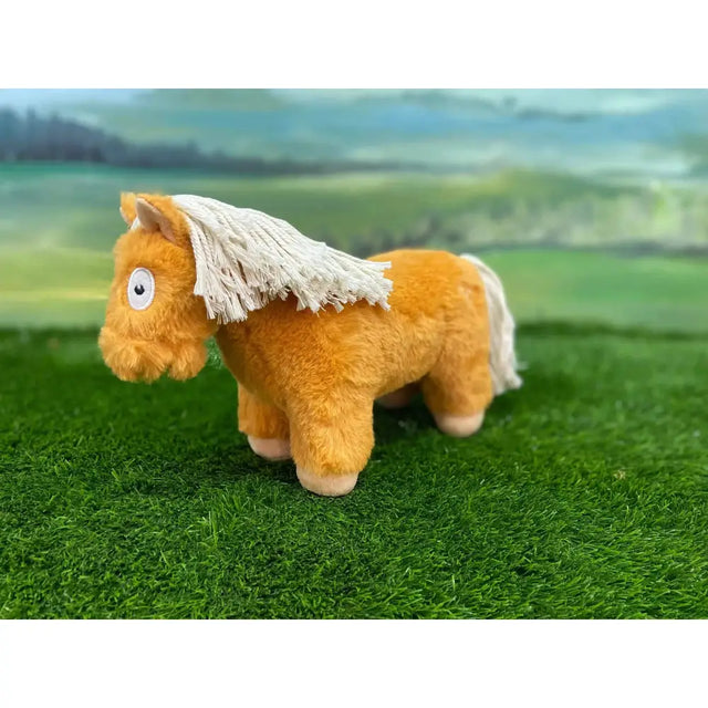 A plush crafty ponies foal in chestnut orange with a white fringed mane and tail from the crafty pony collection