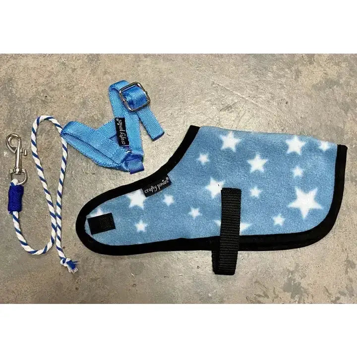 Blue star-patterned fleece dog coat with black trim and matching harness from crafty ponies foal rug set for foal accessories
