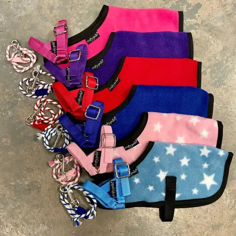 A crafty ponies foal set featuring colorful plush horse halters with star patterns and matching braided lead ropes