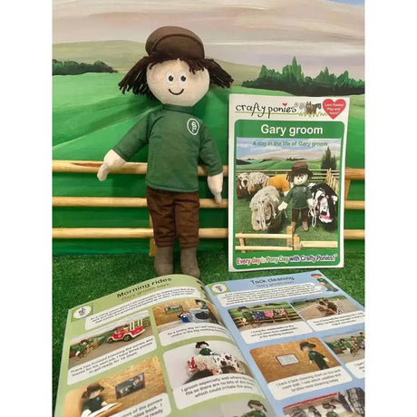 A plush doll from crafty ponies gary family wearing a green long-sleeved shirt brown pants and matching brown cap